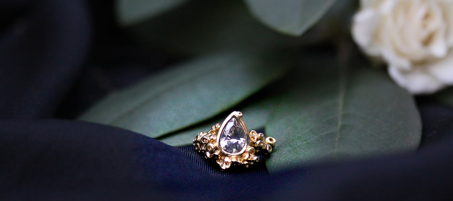 ORGANIC NATURE INSPIRED ENGAGEMENT RING WITH GRAY PEAR SHAPED DIAMOND AND 18K SEASPONGE OR CORAL REEF INSPIRED TEXTURE