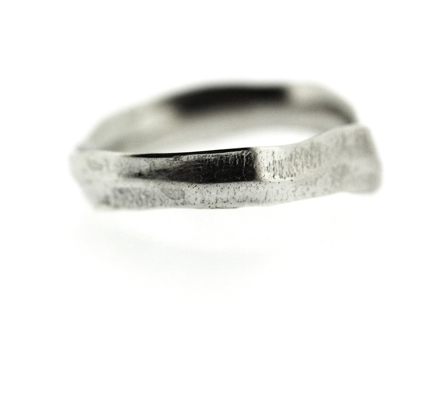 Close up view of side of white gold Frond Arch Band.