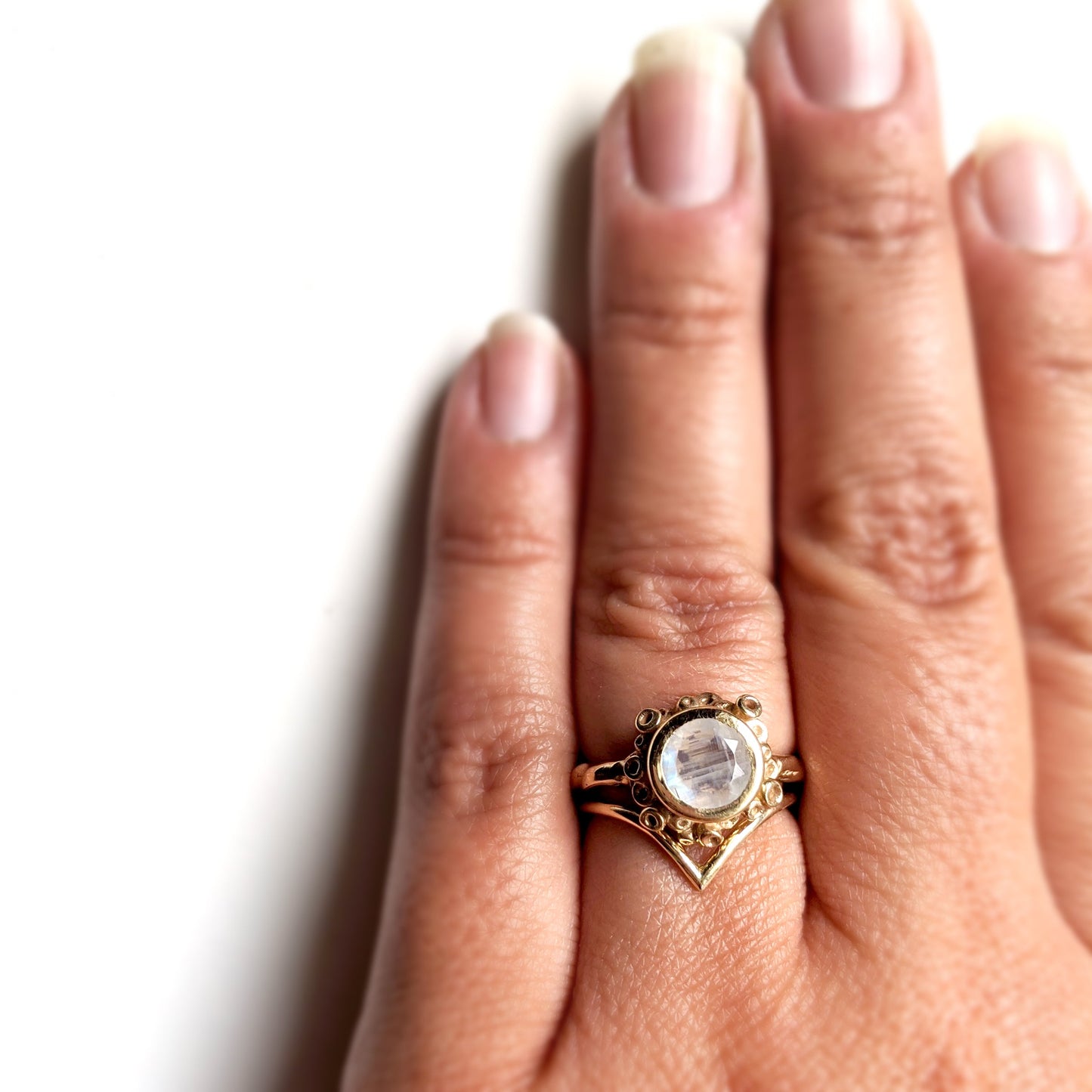 Full view of Botania Ring on woman's hand.