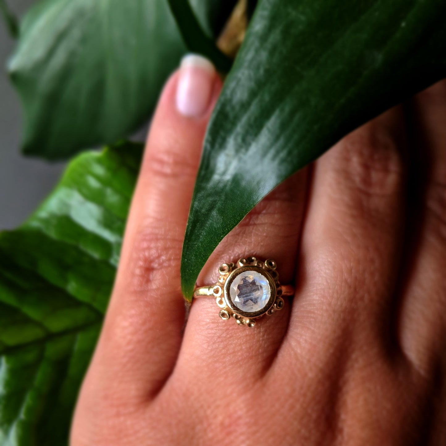 Full view of Botania Ring on woman's hand.