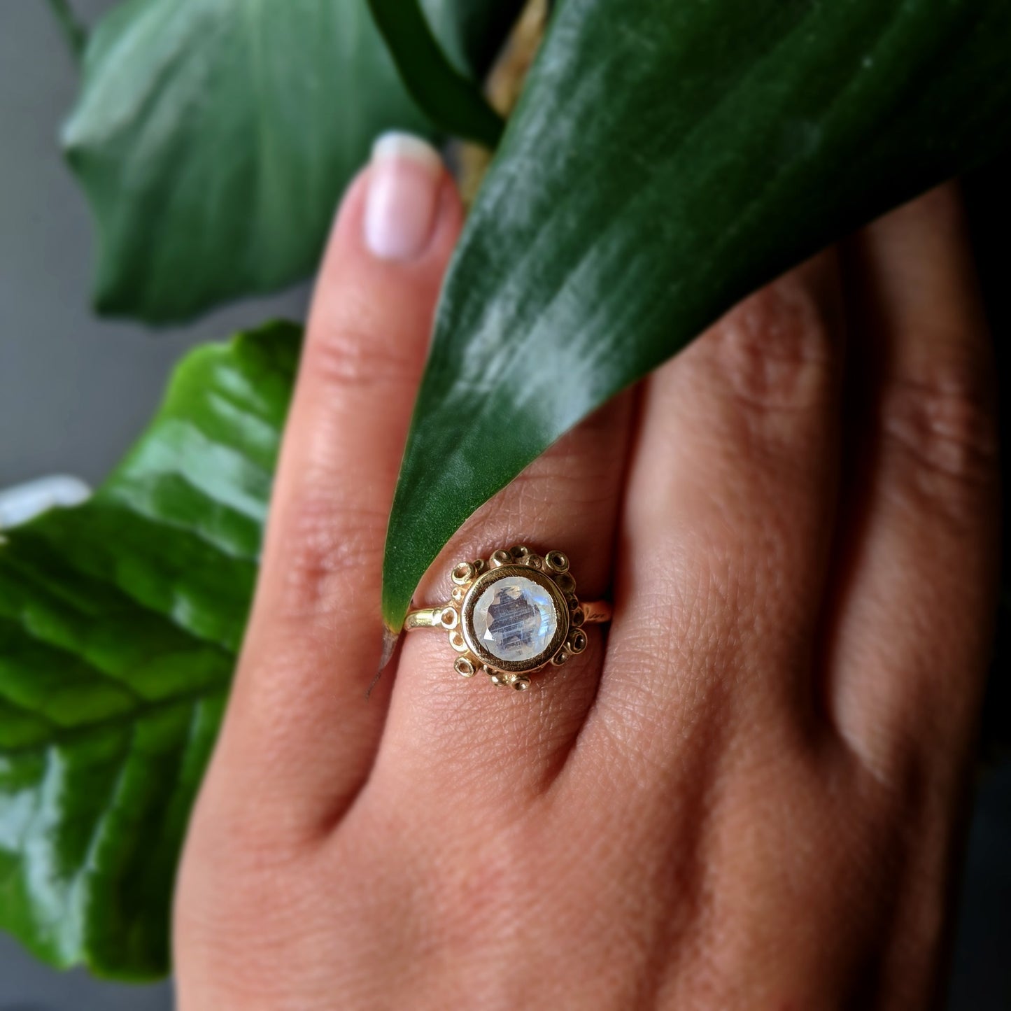Full view of Botania Ring on woman's hand.