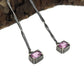 Close up view of pendants on Pink Sapphire Gina Dangle Earrings.