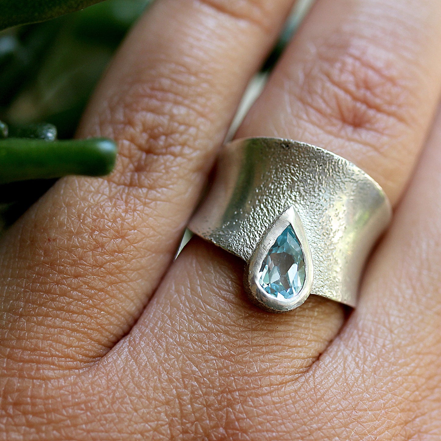 Detailed view of Astoria Ring on woman's hand to help give an idea of its scale.