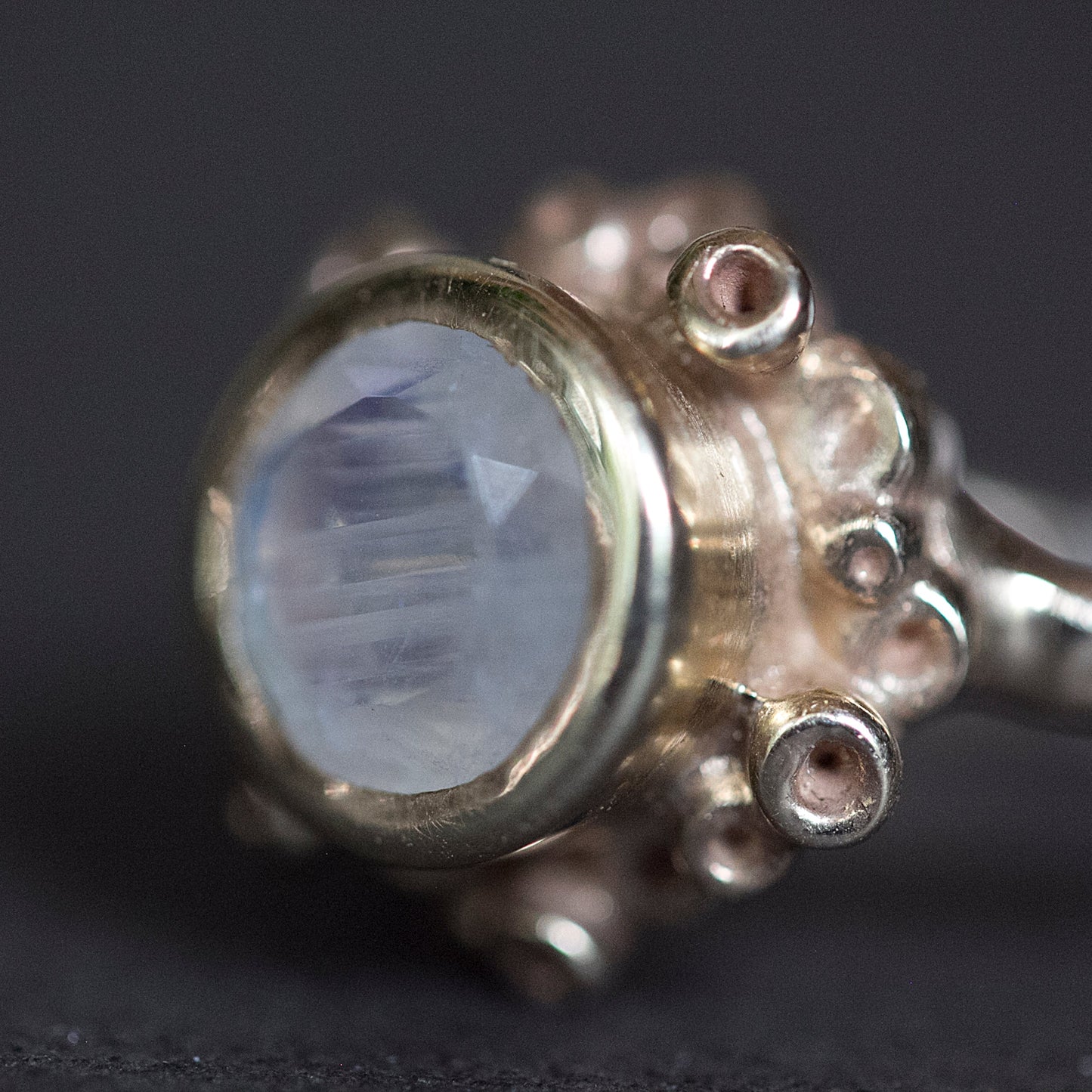 Detailed view of pendant on Botania Ring.