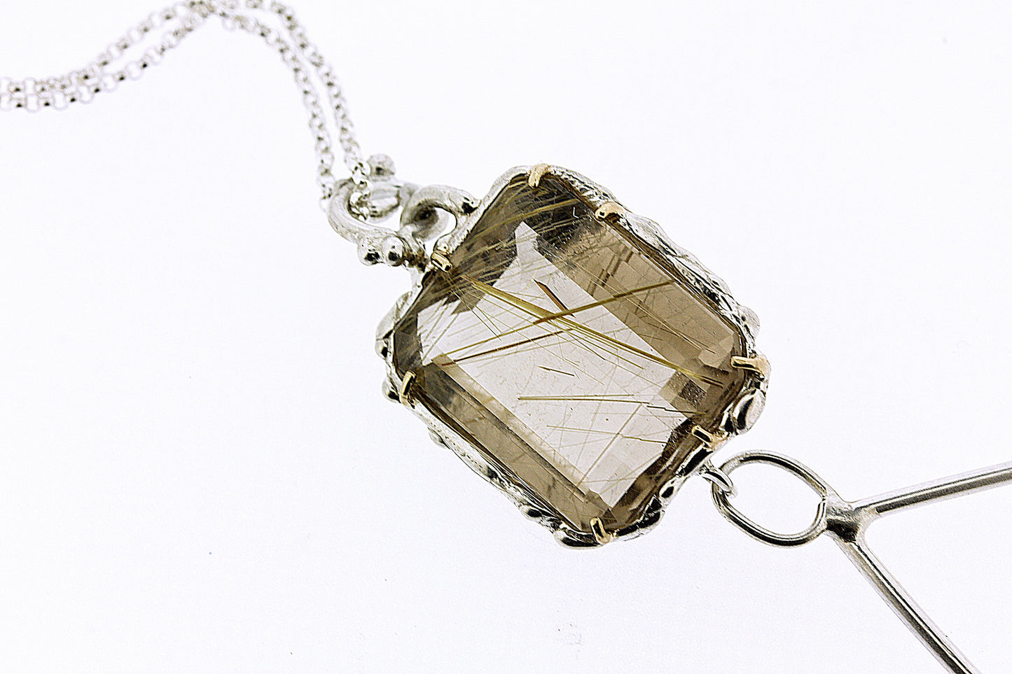 Detail shot of rutilated quartz on Trina Necklace.