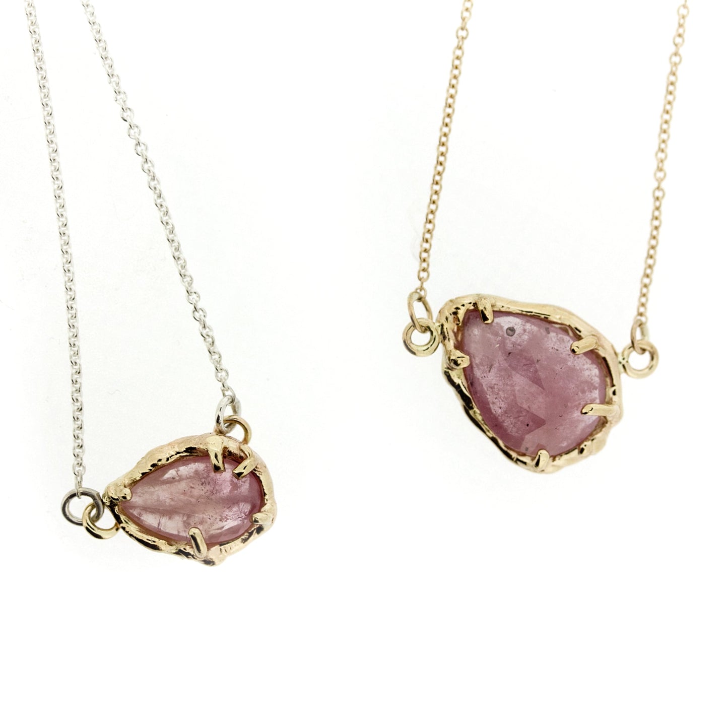 Close up view of small and large Marta pendants.