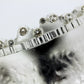 Detail shot of white sapphires on Angelina Cuff.