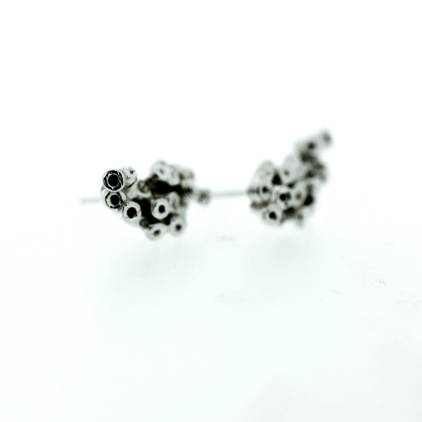 Close up view of Ashton Crawler Earrings.