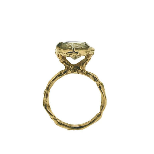 Side profile of opening of Rutilated Quartz Ring. here you can see the basket setting that the rutilated quartz is laying in.