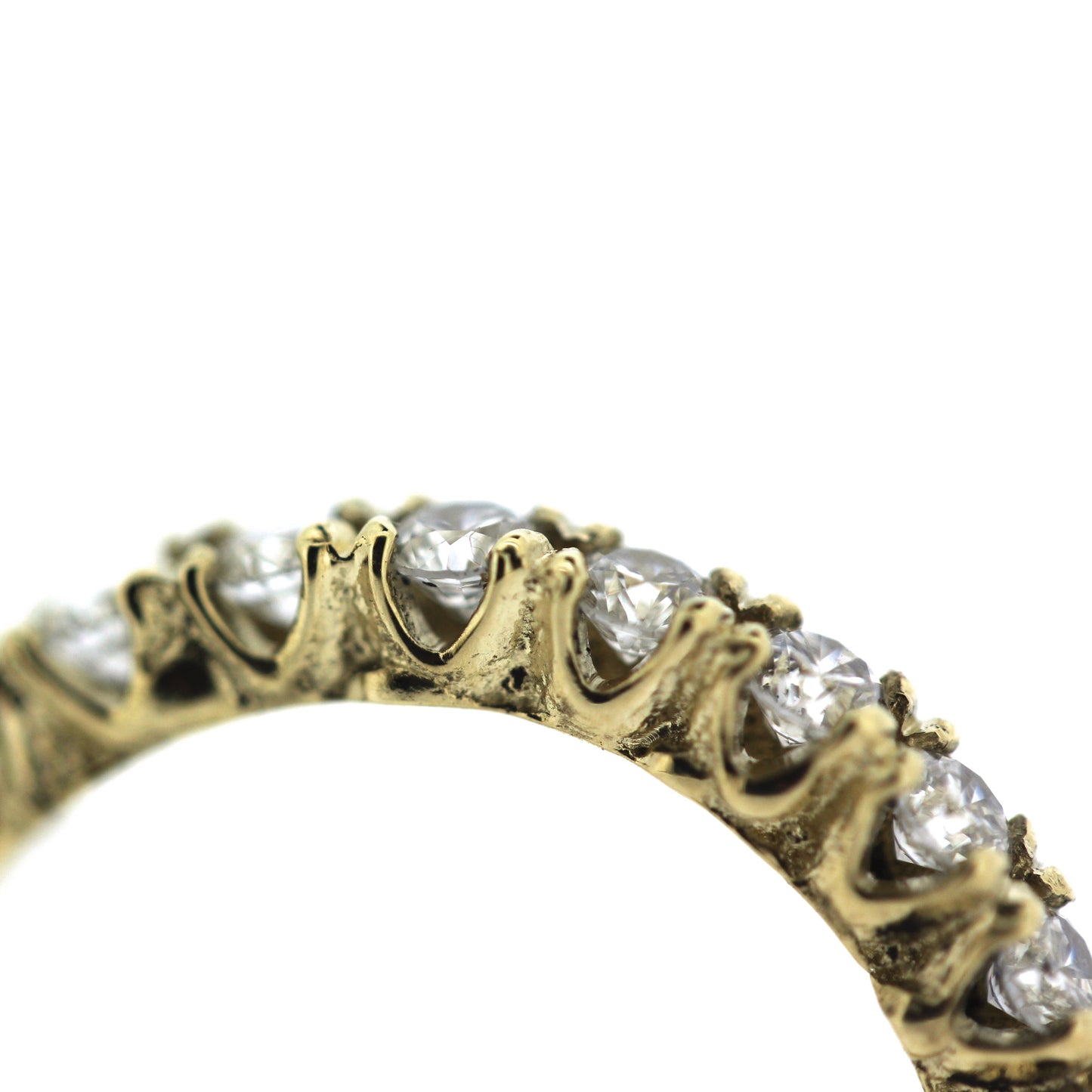 2mm diamond engagement half eternity band with unique organic texture and side viewing, detail view of side opening between prongs and organic texture