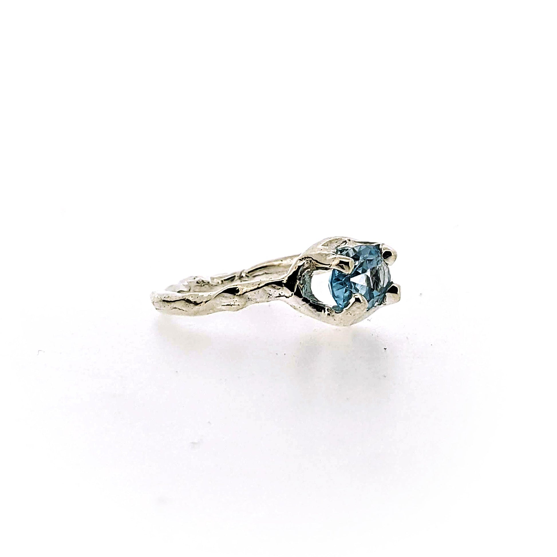 Side view of Ada Ring - Blue Topaz.