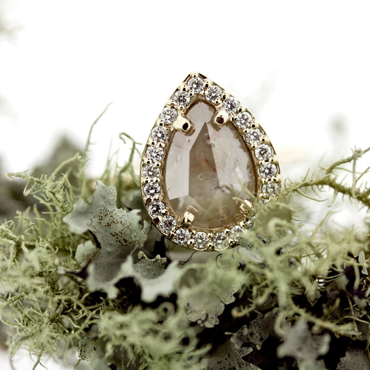 Detail shot of gemstones on Ana Ring - Rustic Diamond with moss in background.