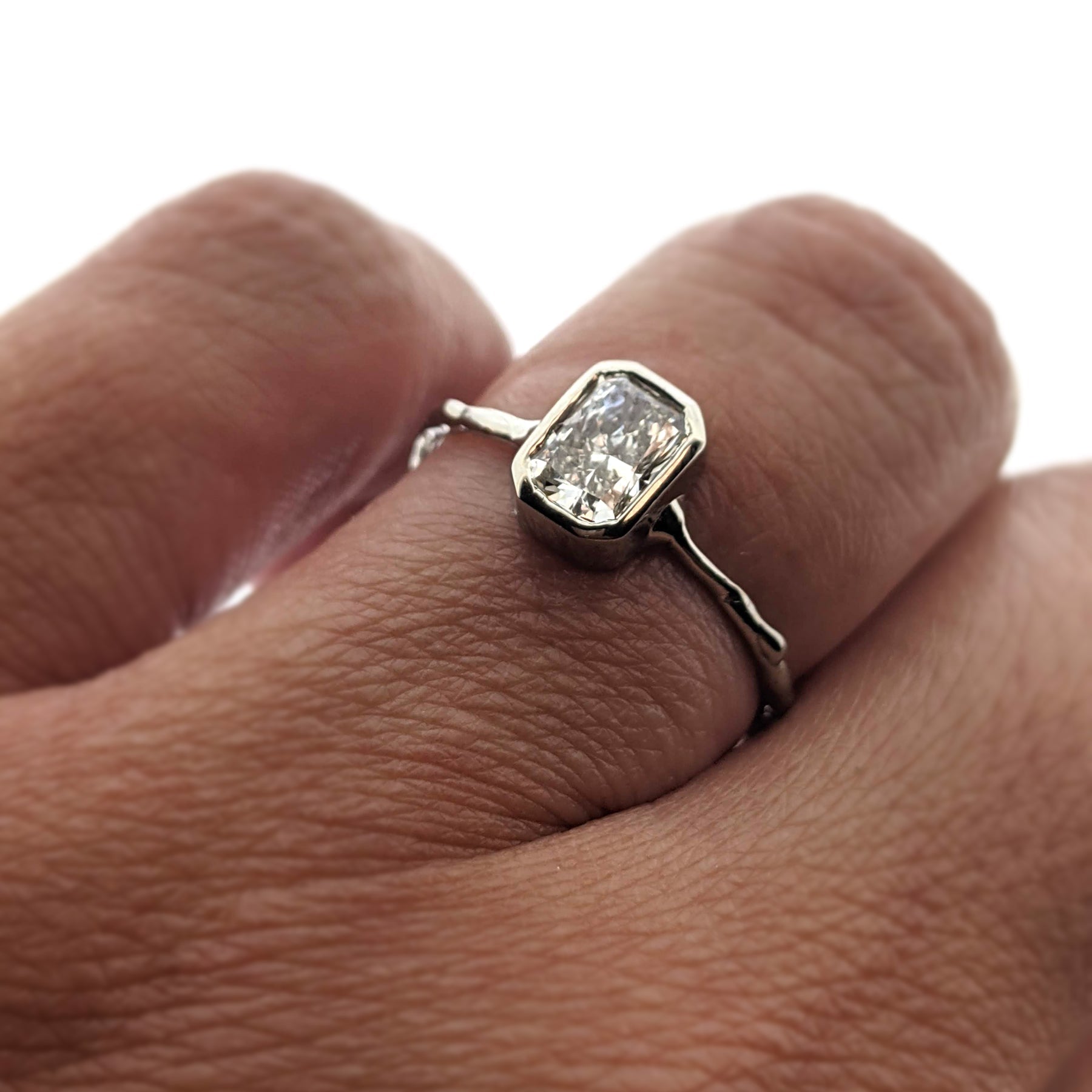 Close up view of AnnaBeth Diamond Ring on woman's hand to help give an idea of its scale.