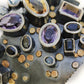 Handmade one of a kind bangle in oxidized sterling silver with Amethyst, Citrine, Topaz, Tourmaline, and Sapphire with 18K Gold dots, detail