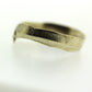Close up view of yellow gold Front Arch Band.