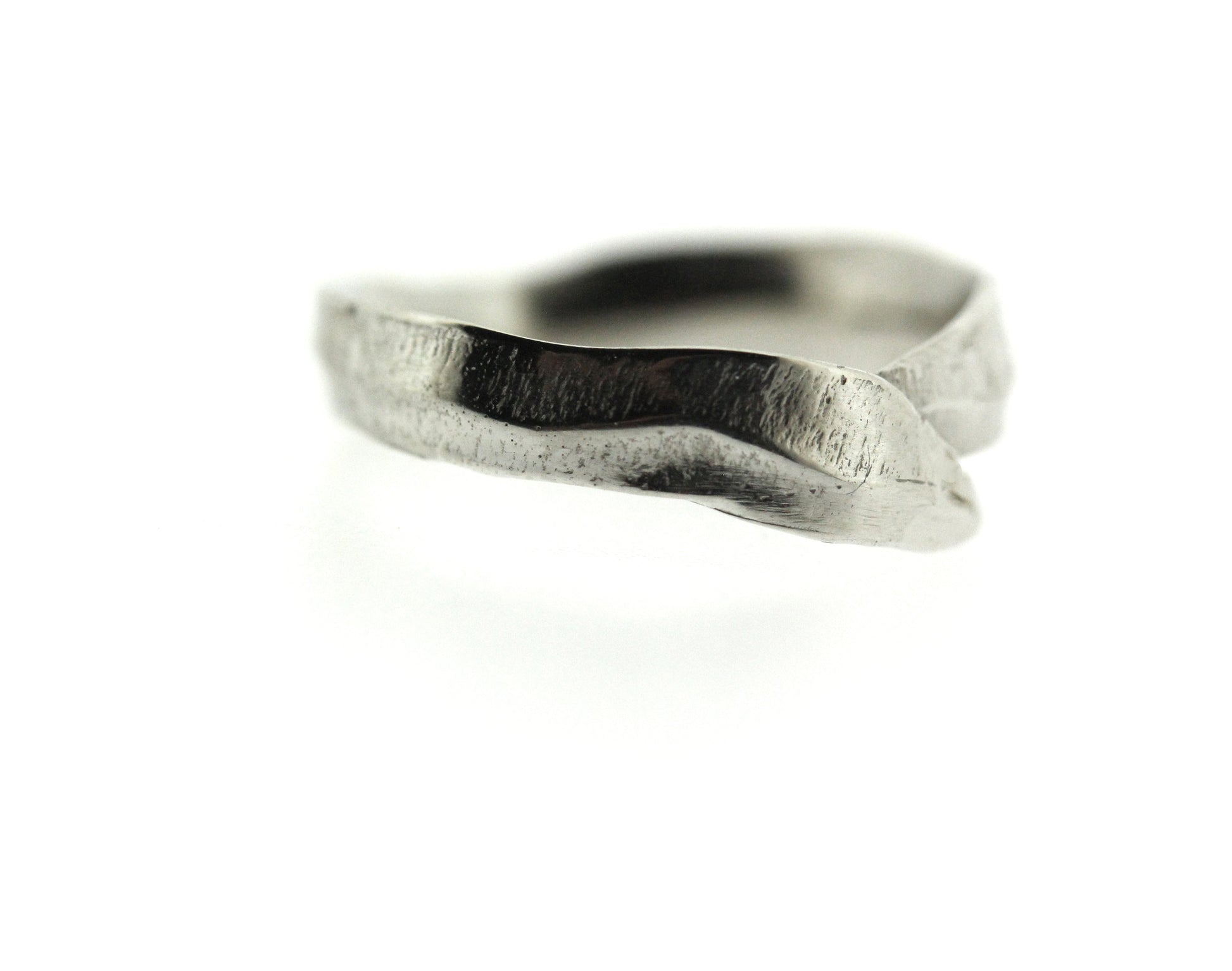 Close up view of white gold Frond Arch Band.