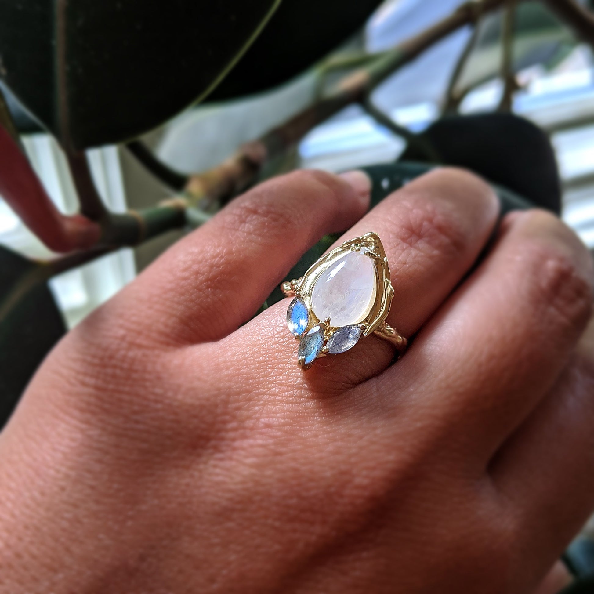 Full view of Celeste Ring on woman's hand to help give an idea of its scale.