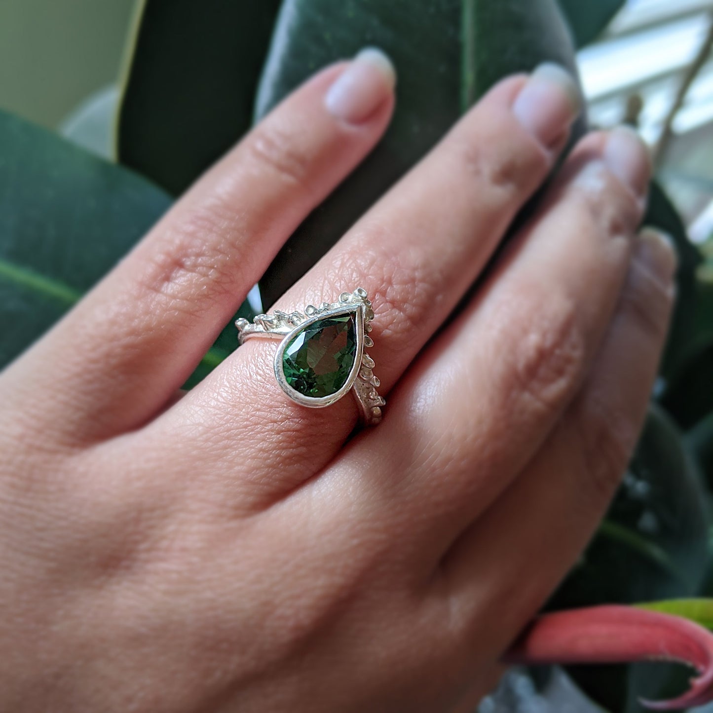 Full view of Gina Ring on woman's hand to help give an idea of its scale.