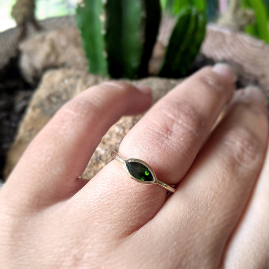 Full view of Olive Ring on woman's hand to help give an idea of its scale.