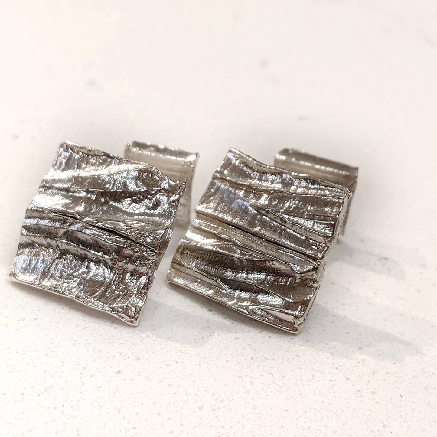 Angled view of Summit Cufflinks.