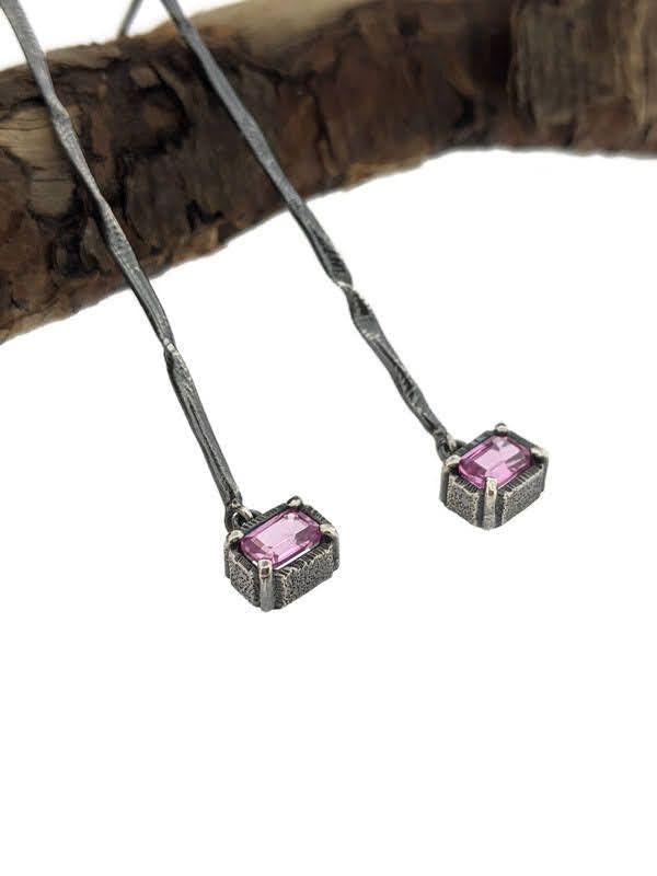 Close up view of pendants on Pink Sapphire Gina Dangle Earrings.