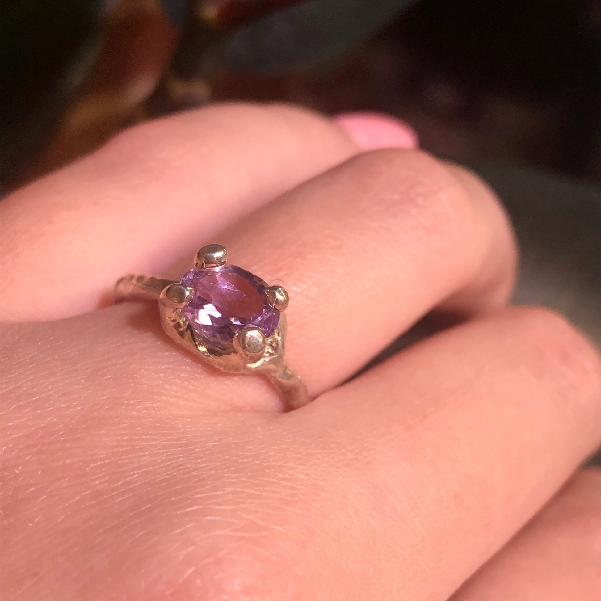 Full view of Ada Ring - Amethyst on woman's hand to help give an idea of its scale.