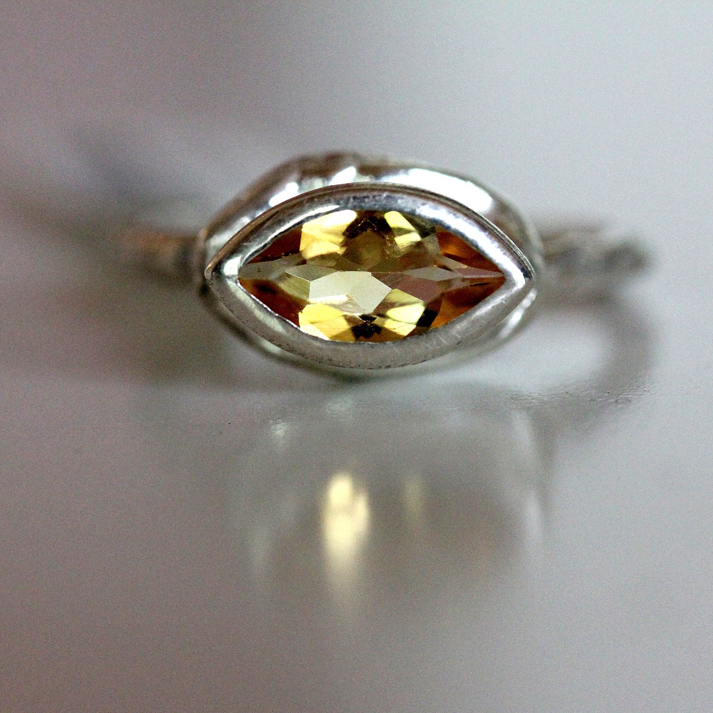 Close up view of gemstone on Corinna Ring.