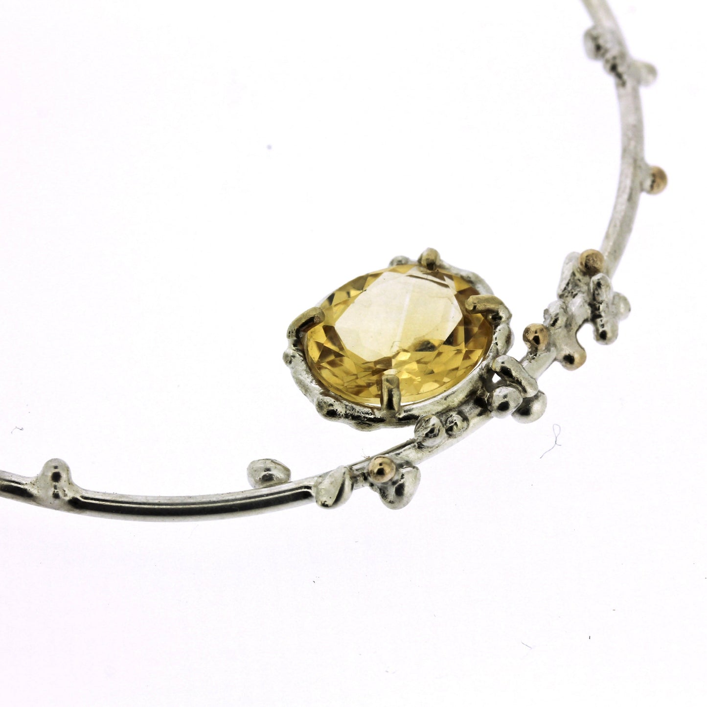 Detail shot of citrine on Trina Necklace.