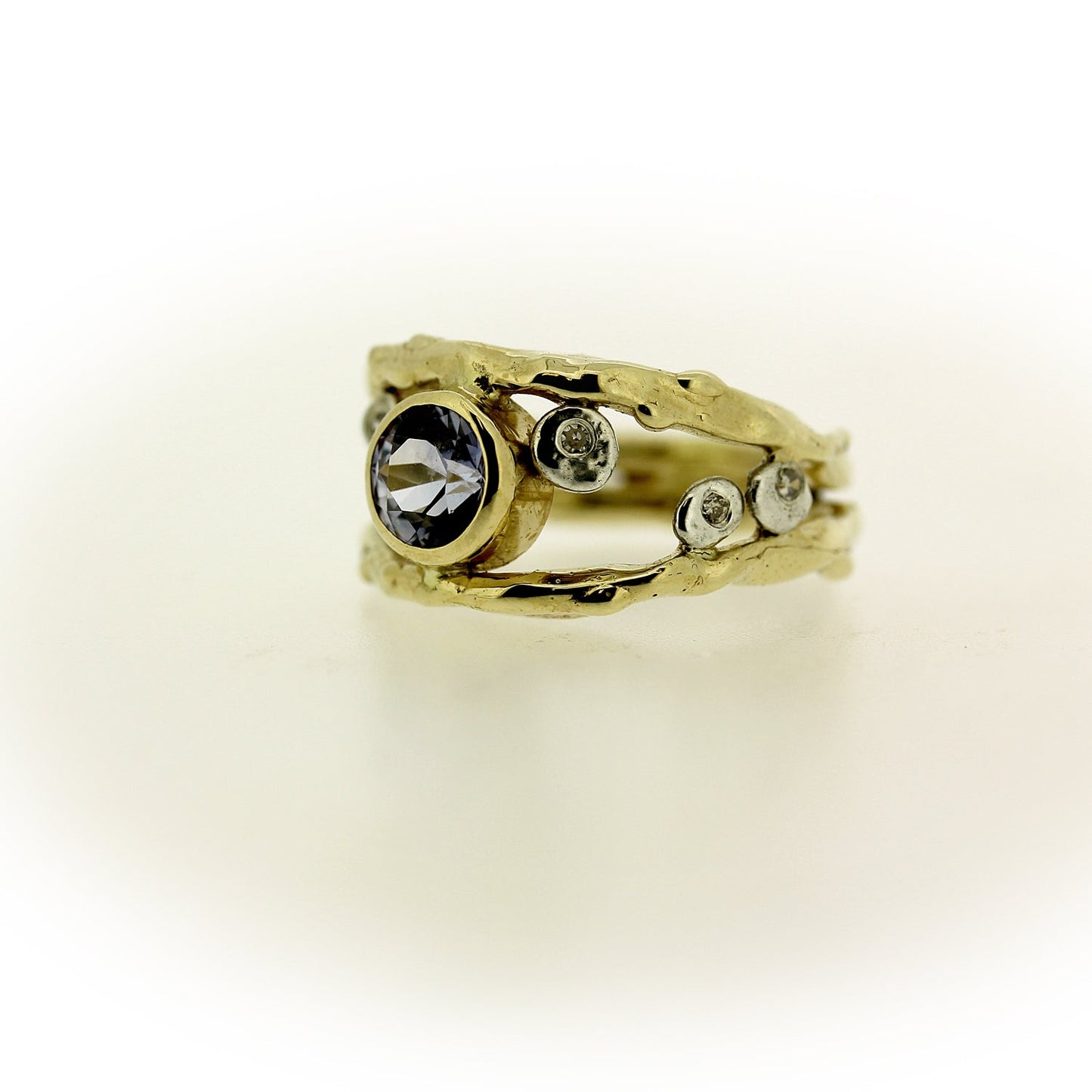 Color change sapphire, diamond, and 18K gold organic ring by Katie Poterala Jewelry, side view