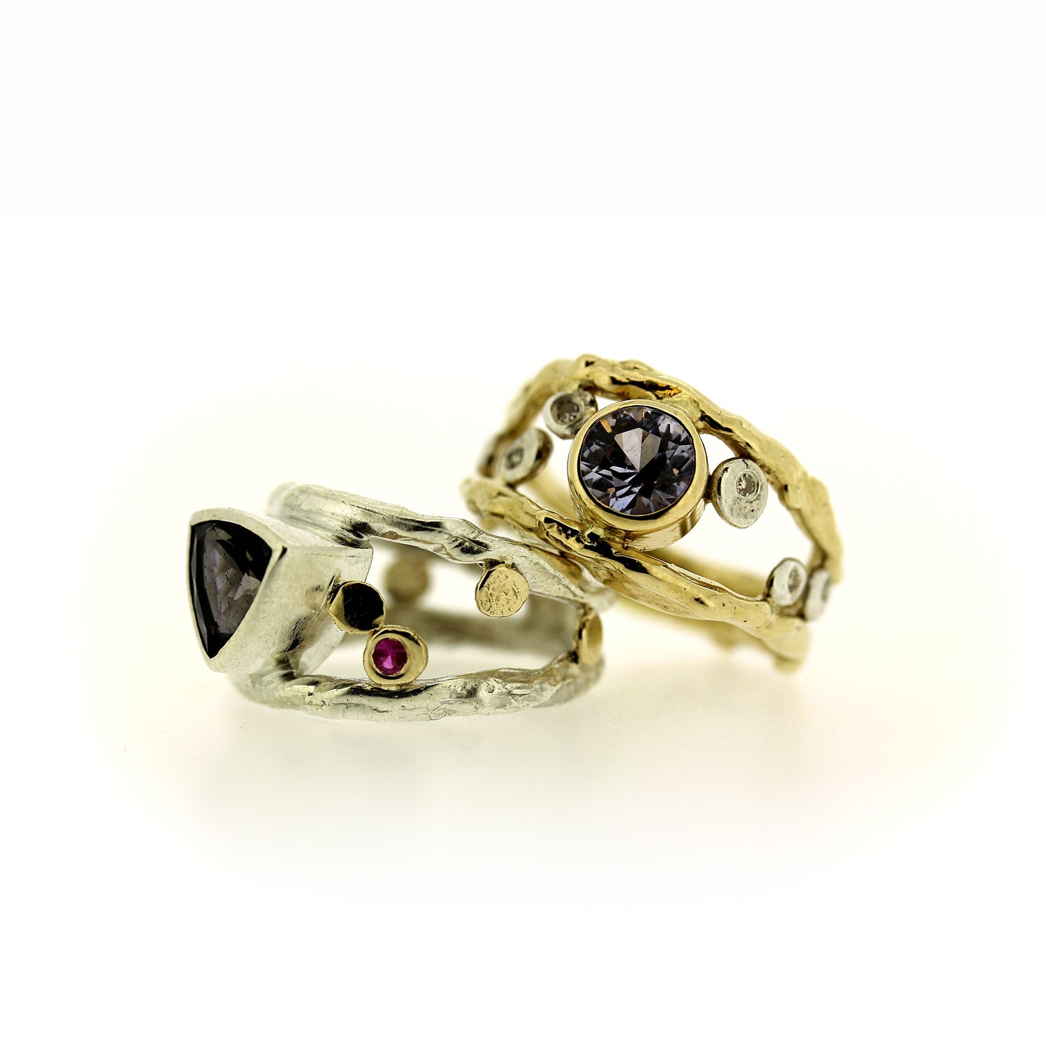Rings in Sapphire and Iolite with Diamonds and Rubies, stacked, by Katie Poterala Jewelry Studio