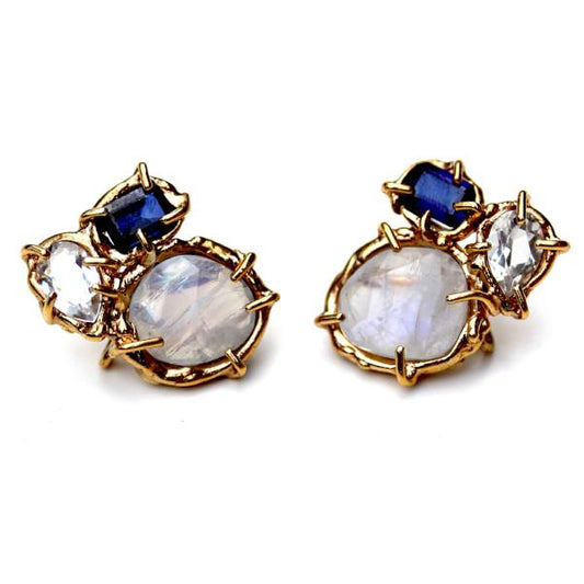 Stud earring with lab sapphire, moonstone and white topaz, clustered together in an organic 14K yellow gold setting.