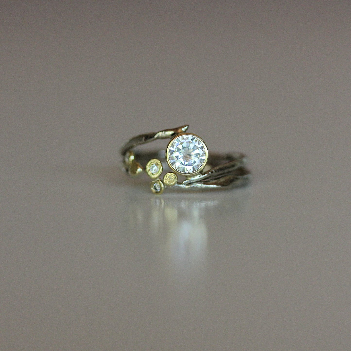 one of a kind engagement ring set in 18k yellow gold, 14k white gold.