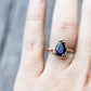 Full view of Lyla Ring on woman's hand to help give an idea of its scale.