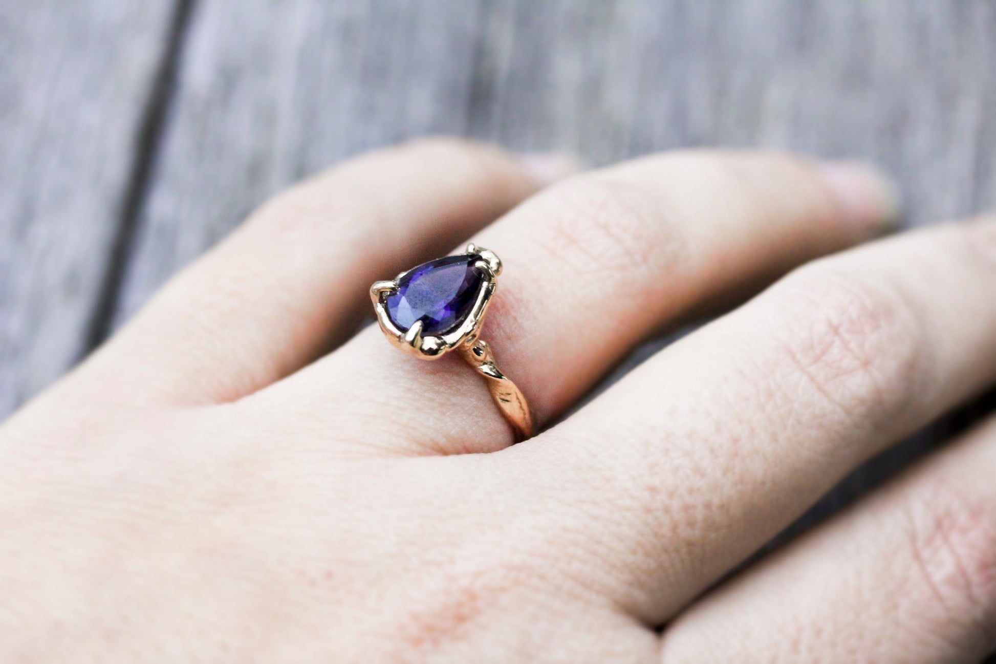 Full view of Lyla Ring on woman's hand to help give an idea of its scale.