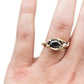Full view of Marissa ring on woman's finger to help give an idea of its scale.
