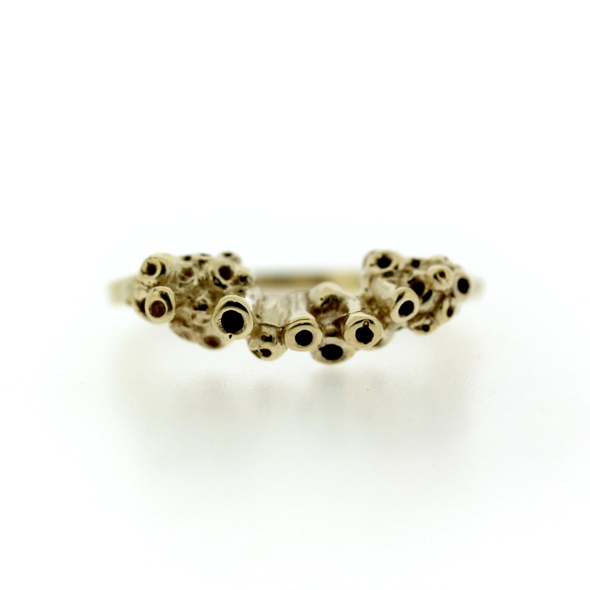 Full view of Skerry band. This gold band features Katie's signature seasponge texture.