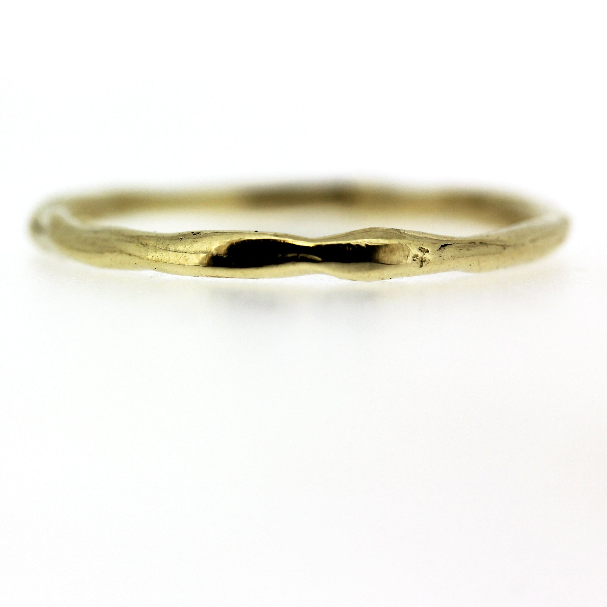 Full view of Men's Stream band. This thin band has and organic look to it like a flowing stream.