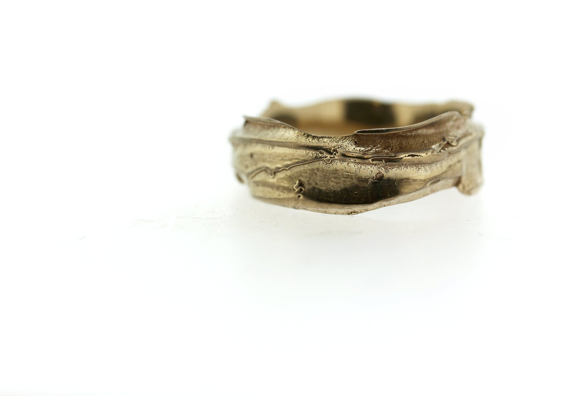 Full view of gold Men's Summit Band.