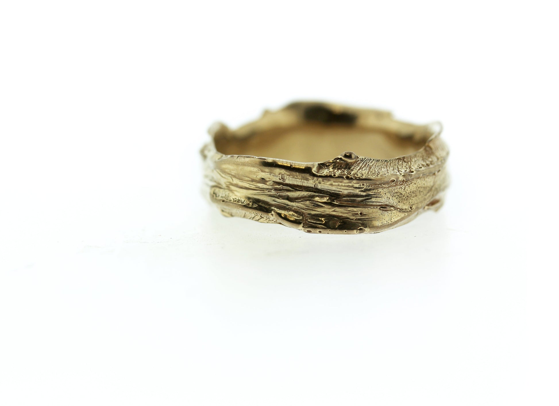 Full view of gold Men's Summit Band.