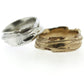 Full view of gold and silver Men's Summit Bands stacked on top of one another.