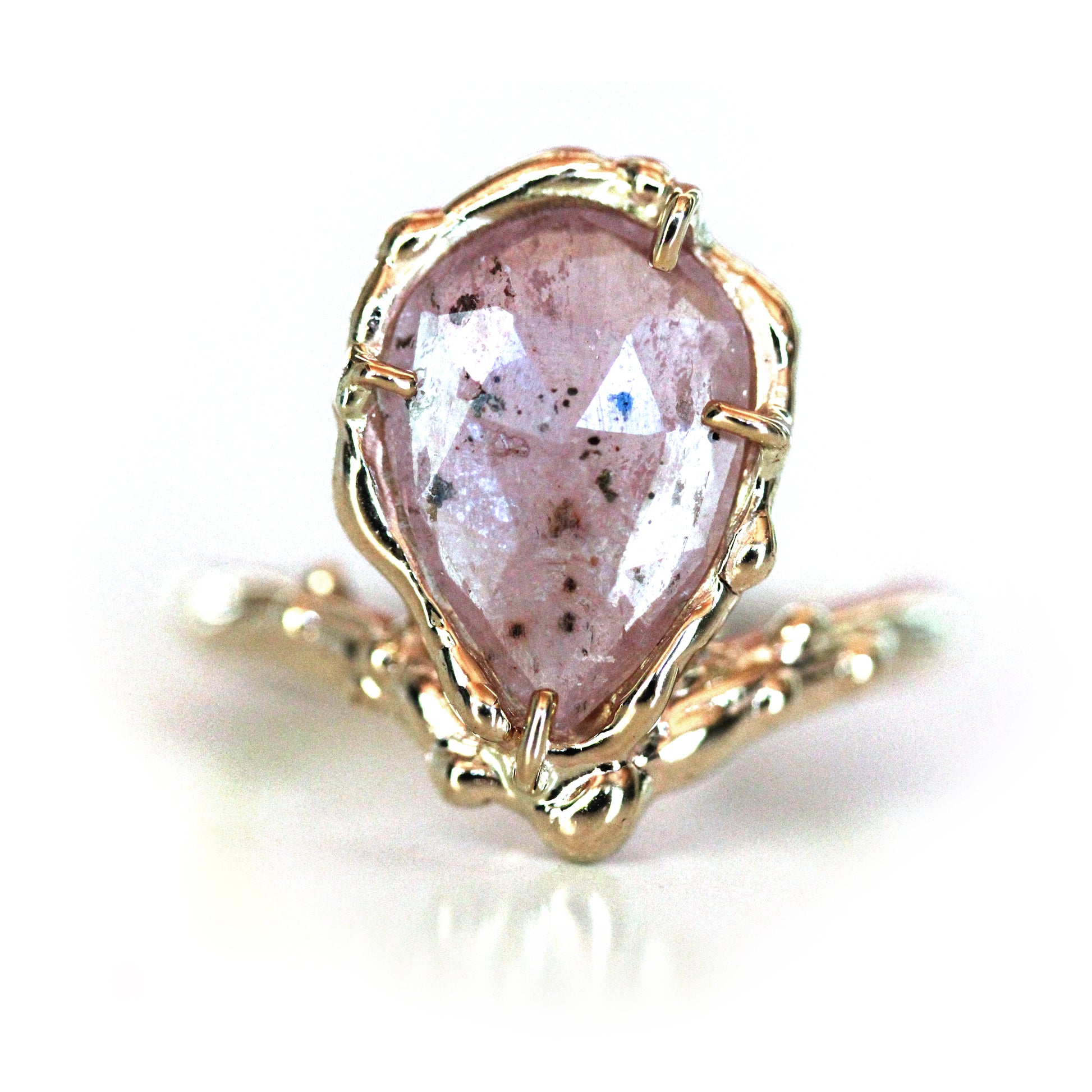 organic pear shaped handmade artist engagement ring with salt and pepper pink rose cut sapphire in asymmetrical perched design