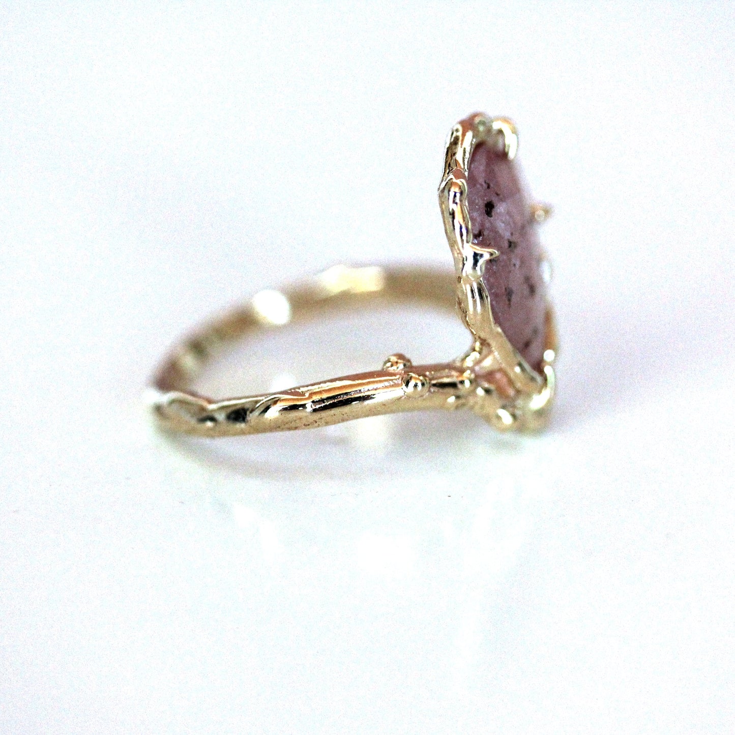 pink sapphire engagement ring side view 