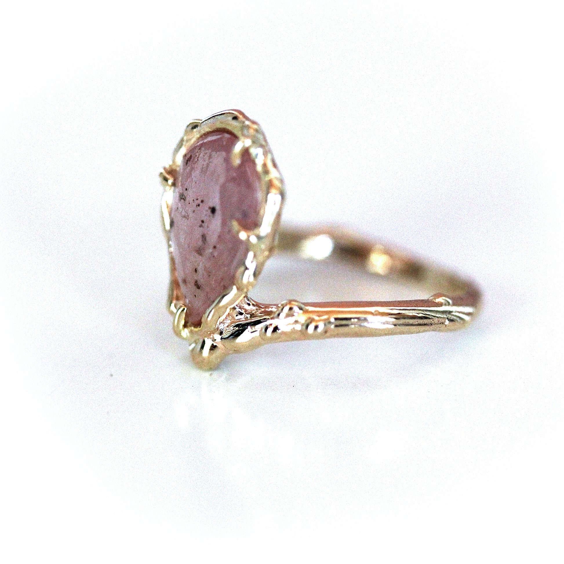 organic low profile pear shaped handmade artist engagement ring with salt and pepper pink rose cut sapphire in asymmetrical perched design