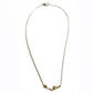 Yellow gold V-style necklace with three small accent diamonds.