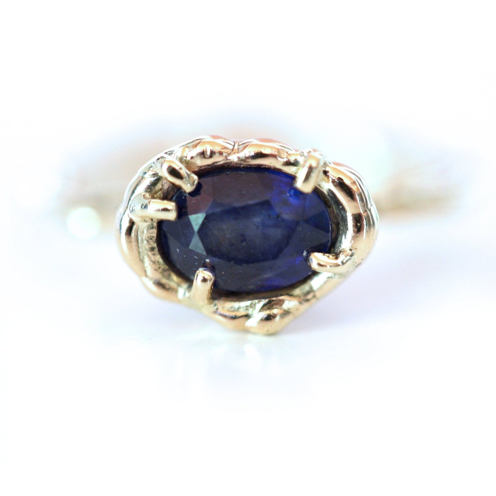Close up view of sapphire in Gianna Ring.