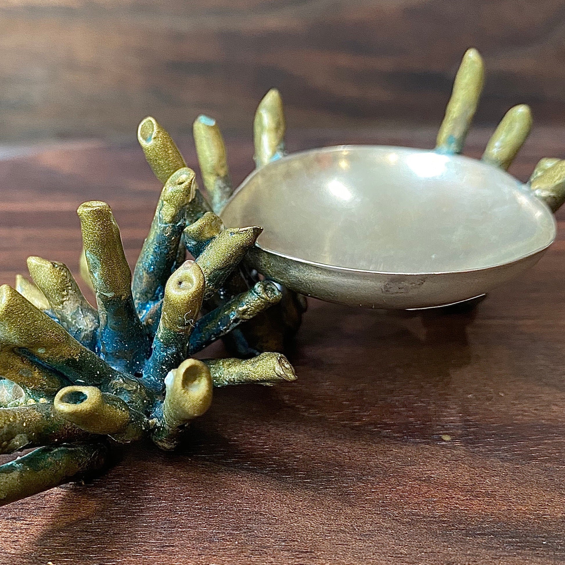 Side view of gold and green patinaed Sea Sponge Trinket Dishes.