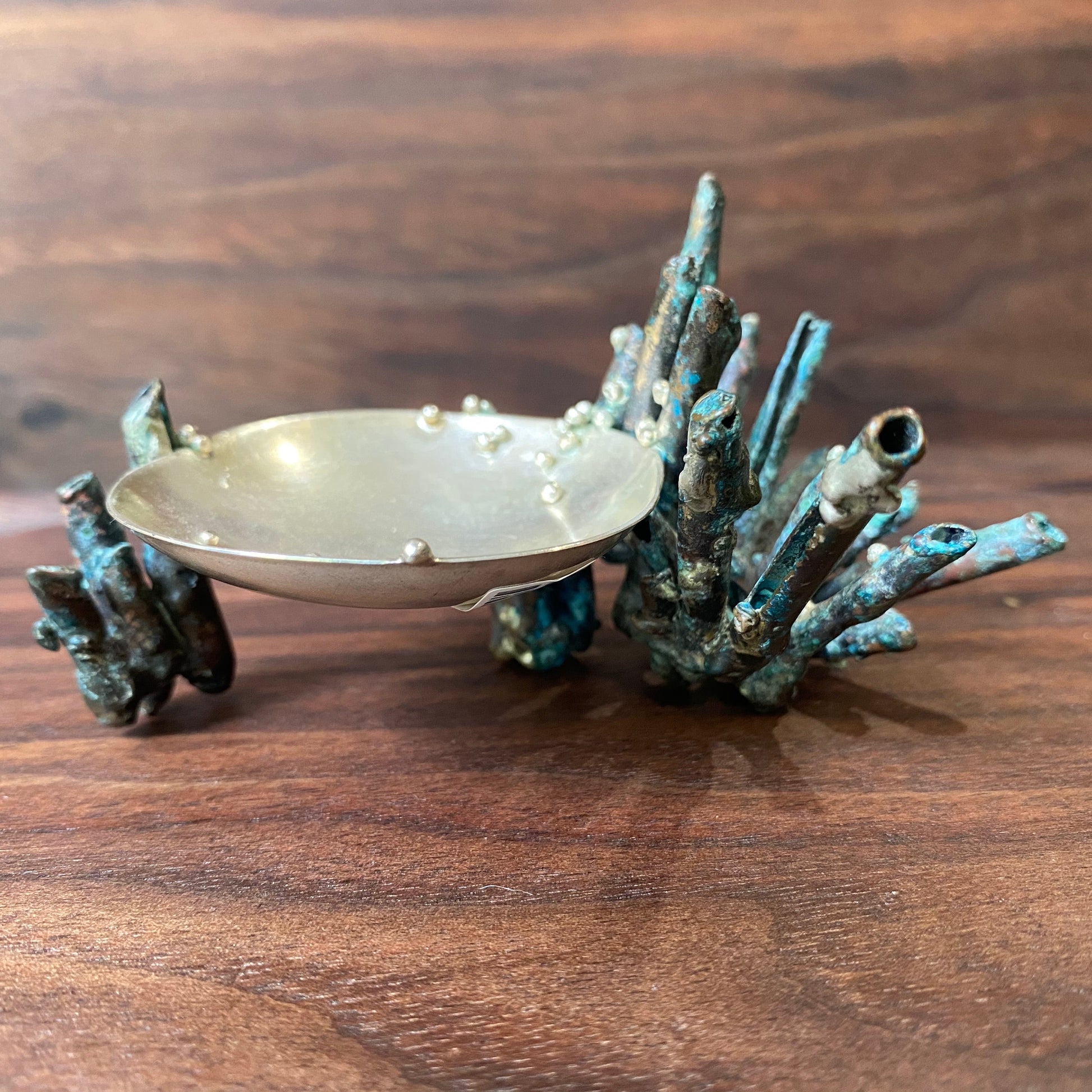 Side view of green patinaed Sea Sponge Trinket Dishes.