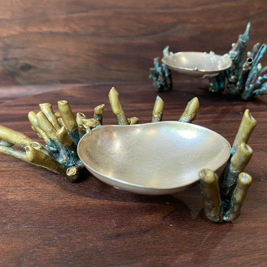 Full view of two Sea Sponge Trinket Dishes. Fabricated from Sterling Silver and patinated Brass, the details on this dish are inspired by sea sponge and coral.