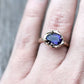 unique handmade purple stone engagement ring with hand wrought organic nature inspired dewdrop or water texture details
