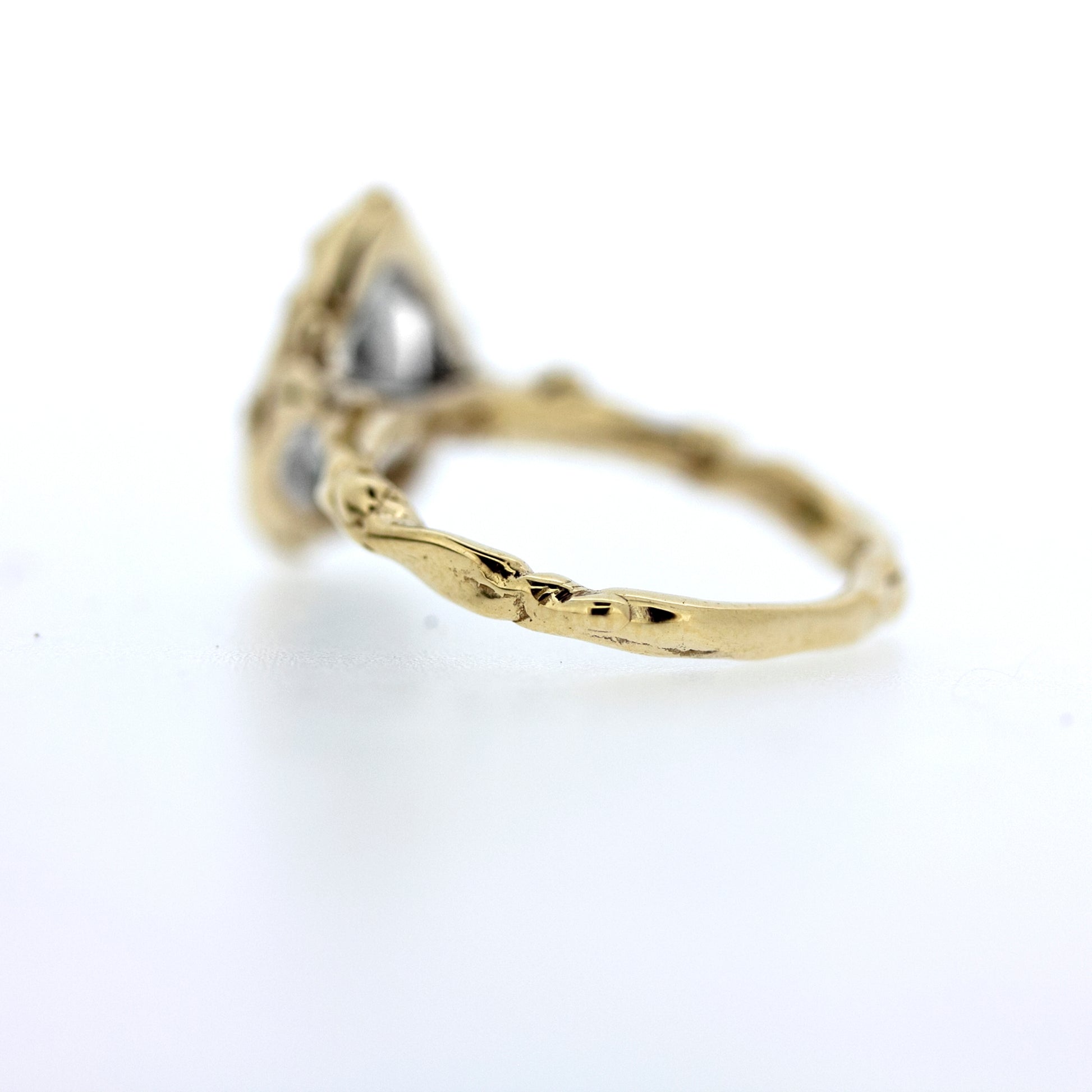 unique handmade engagement ring with hand wrought organic nature inspired twisted water texture details
